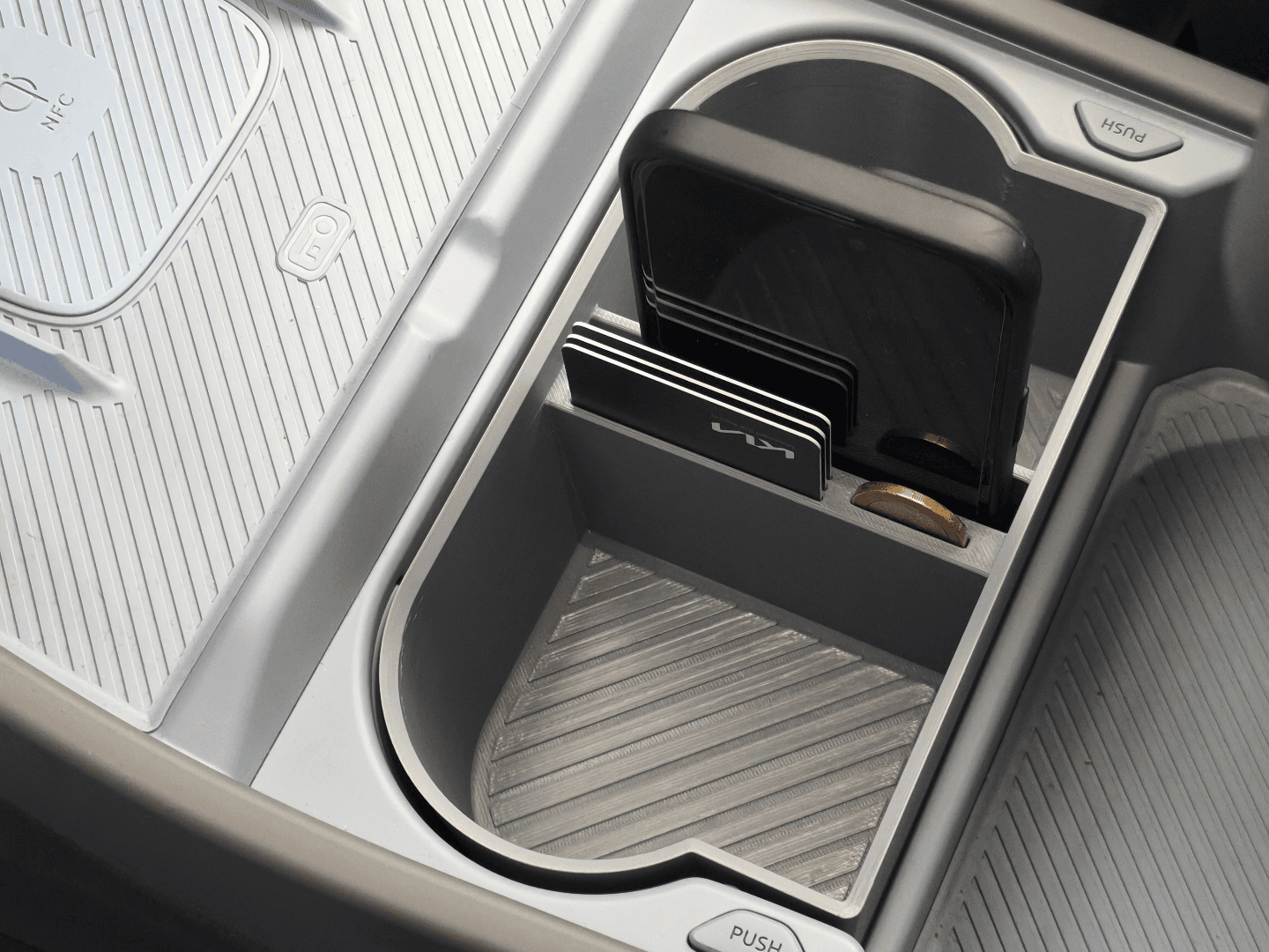 Kia EV3 storage box for cup holder
