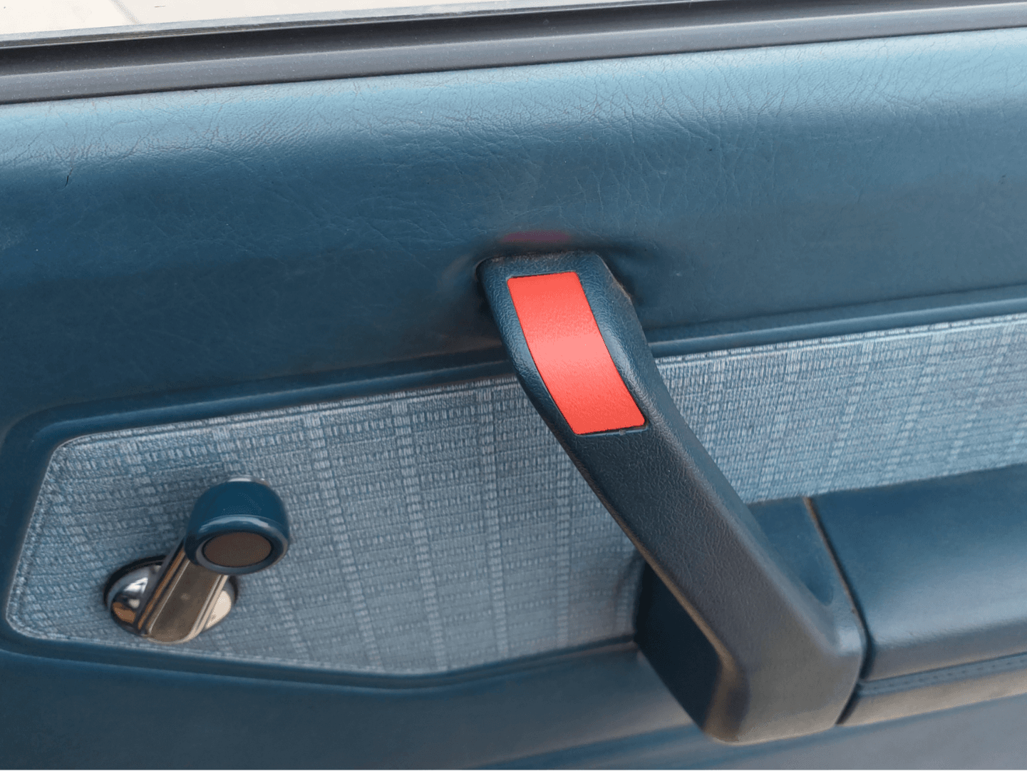 Nissan/ Datsun 720 door handle screw hole plug