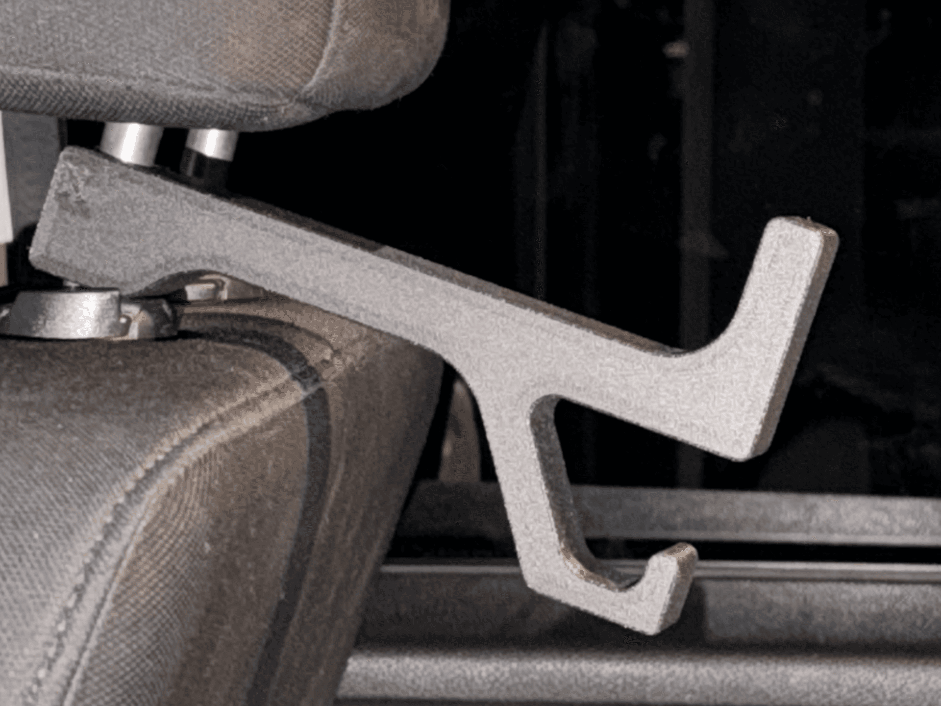 Improved Truck Headrest Hard Hat Vest Hanger 
