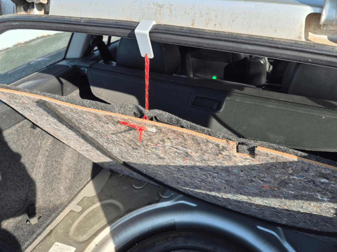 Hook for car trunk / boot floor