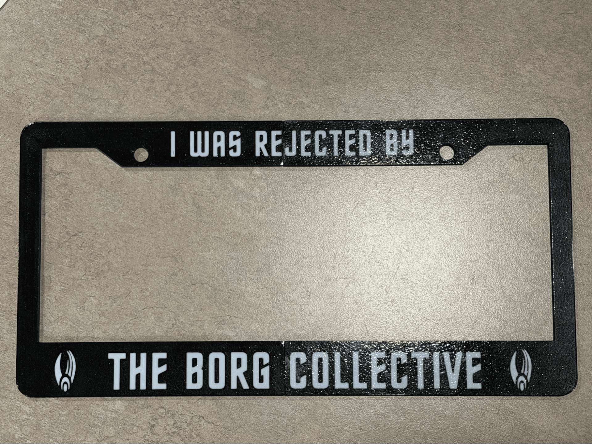 Borg Reject License Plate Frame - US size