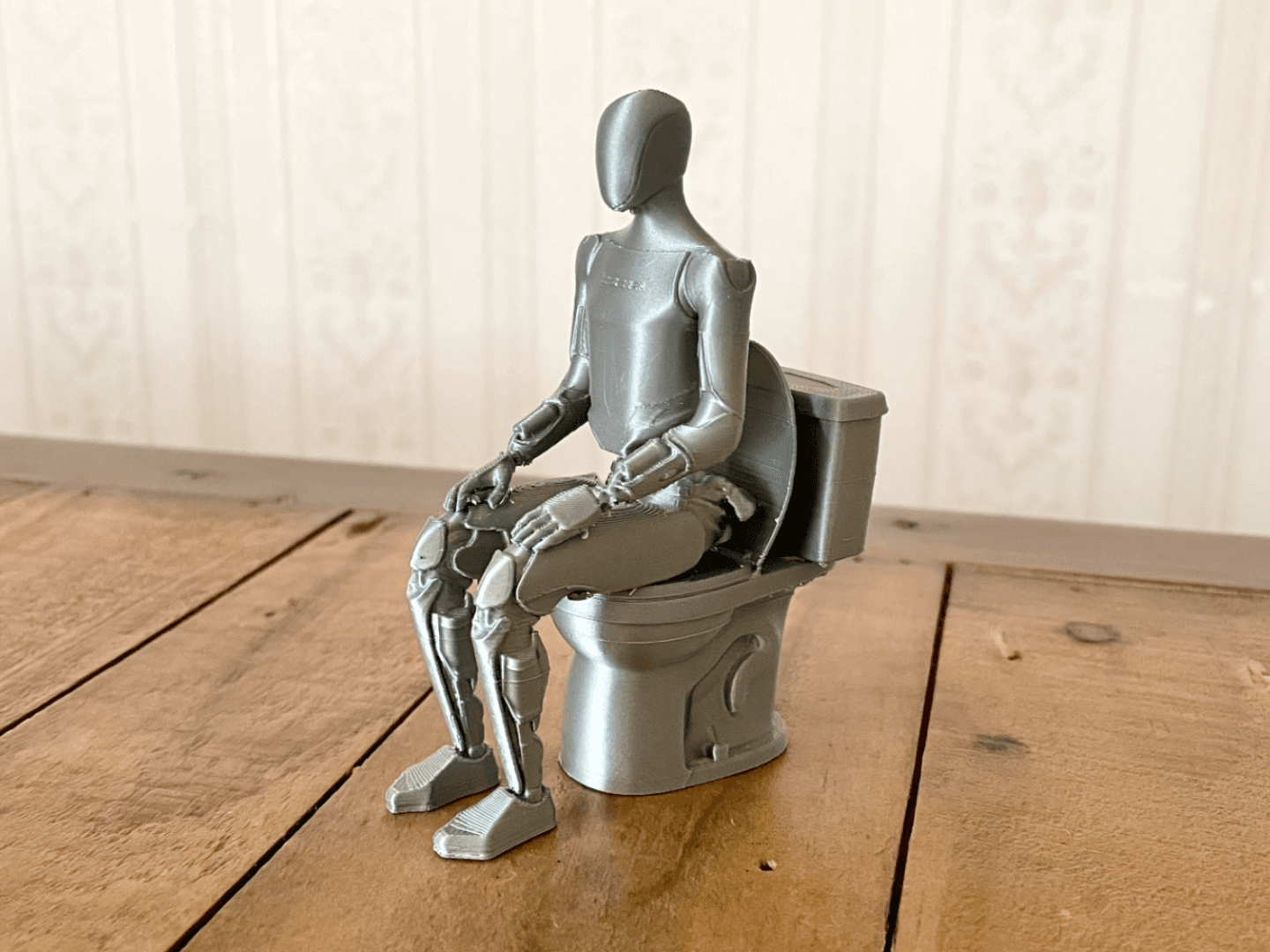 Tesla Optimus on Toilet