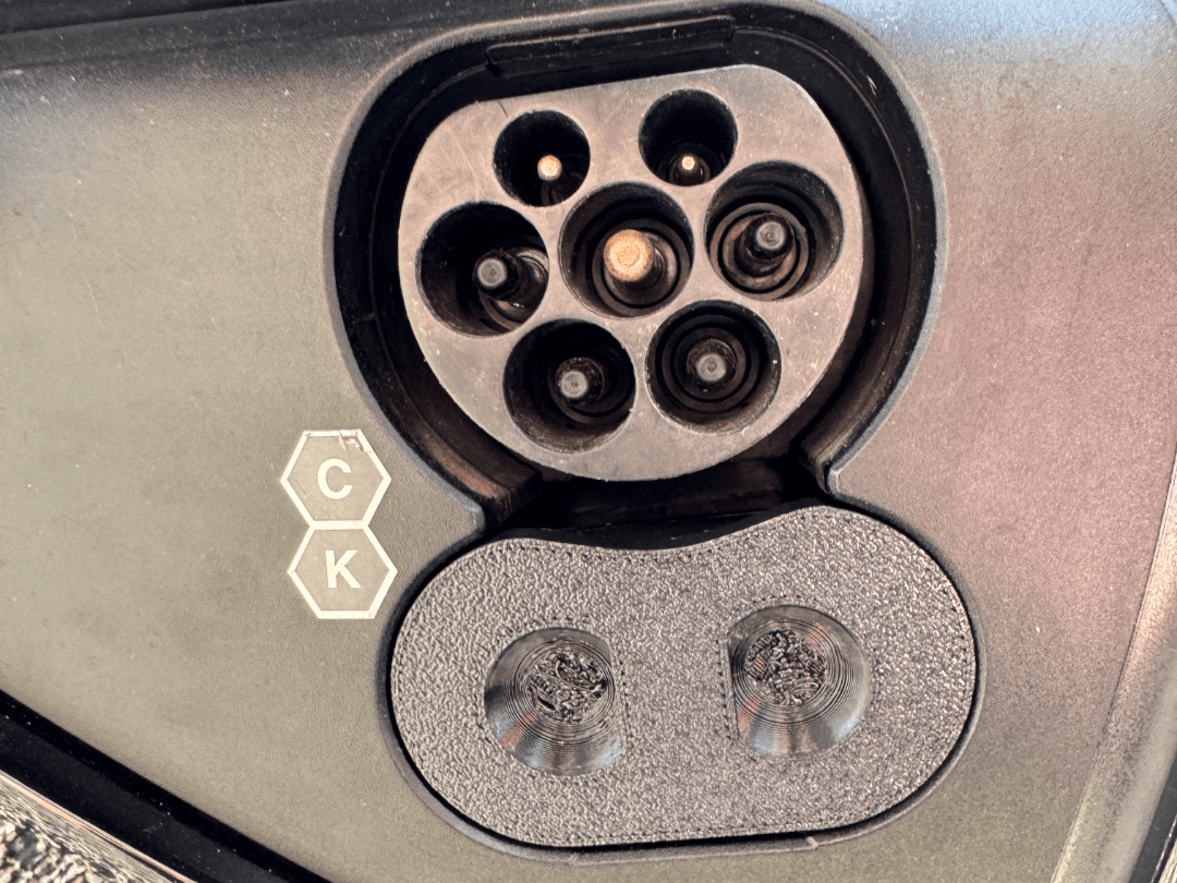 Tesla CCS charge port dust cover