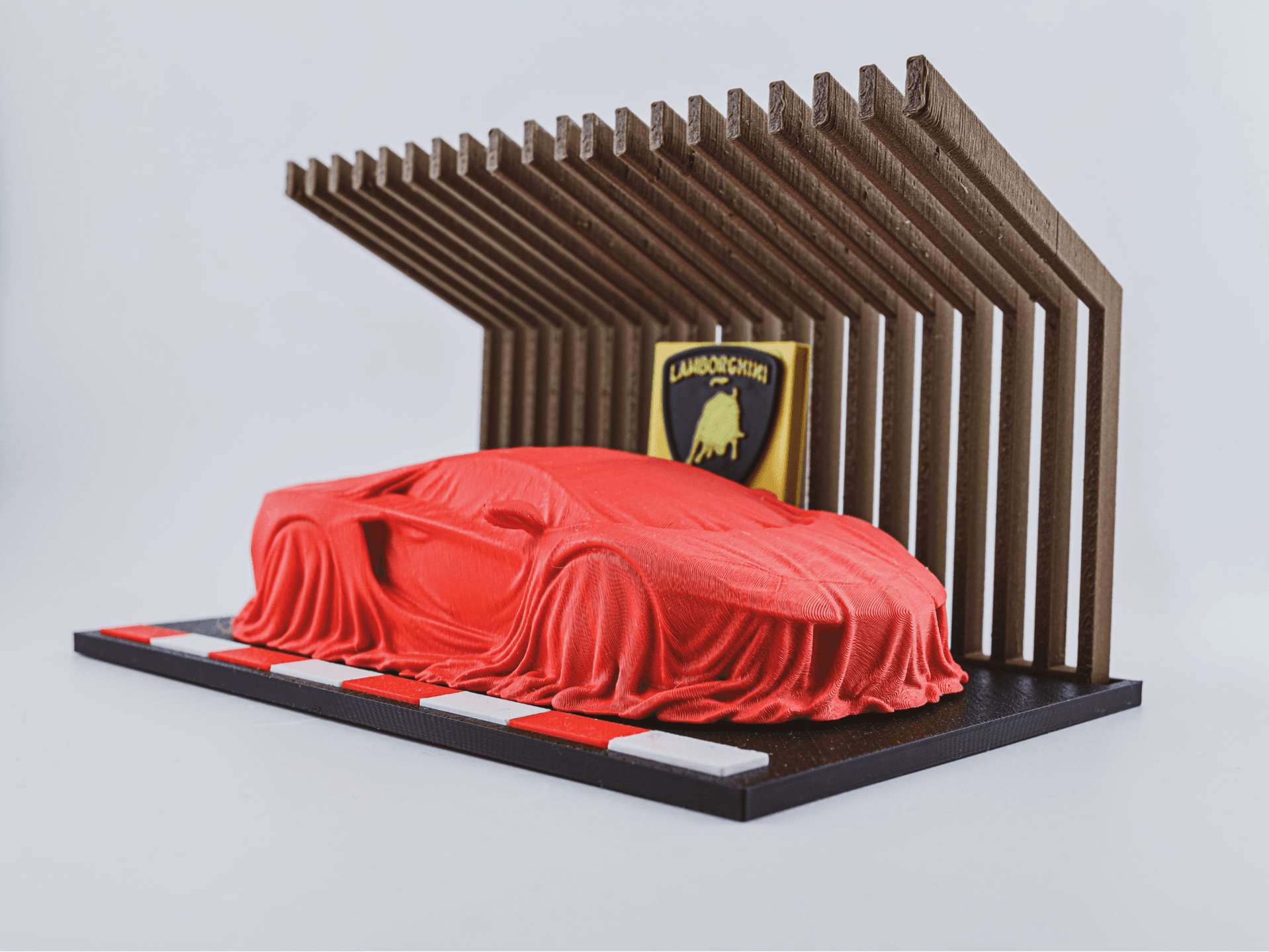 Lamborghini Aventador Covered with a Display Stand