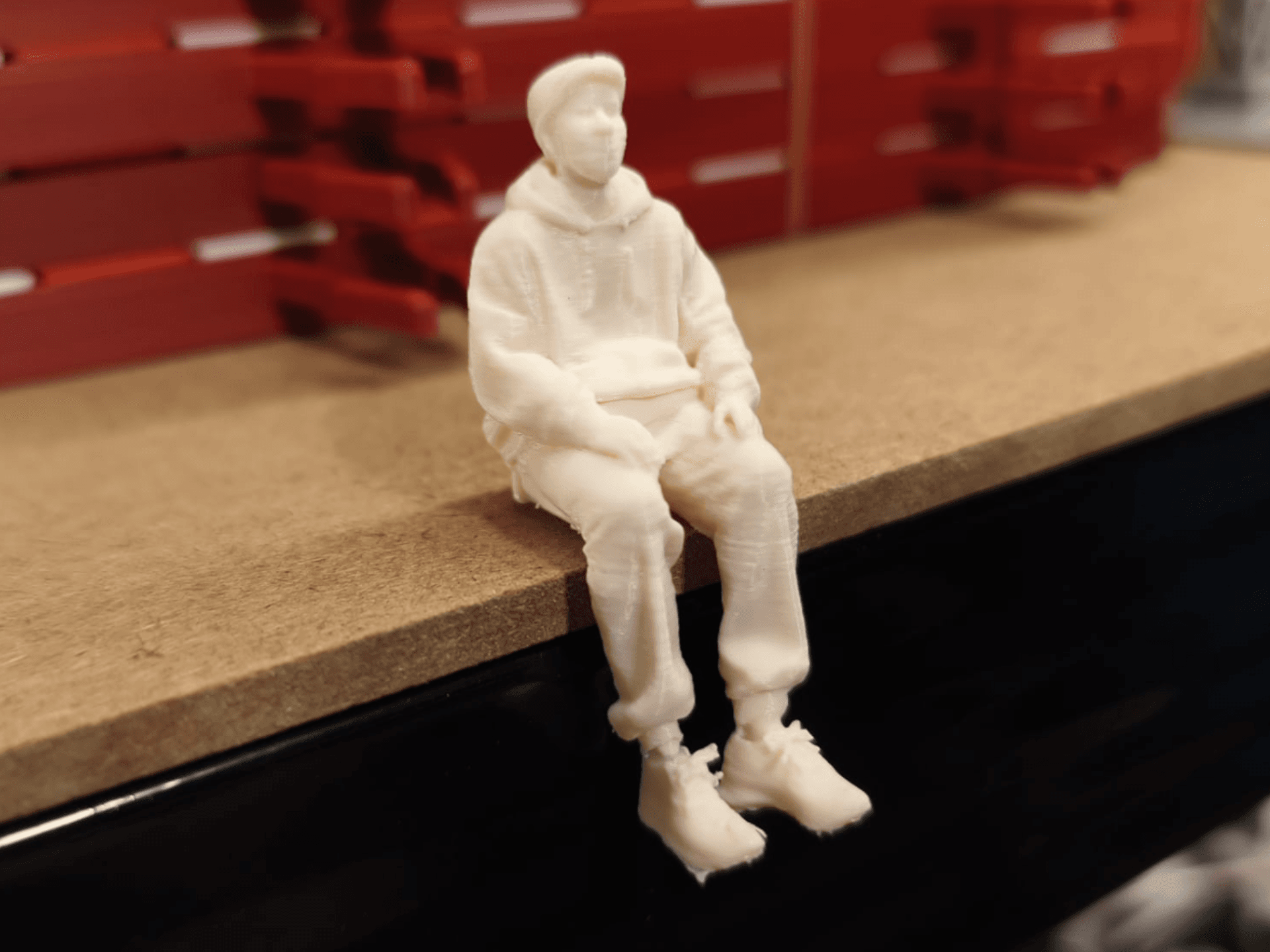Relaxed Sitting Man in Hoodie - 1:32 Figure
