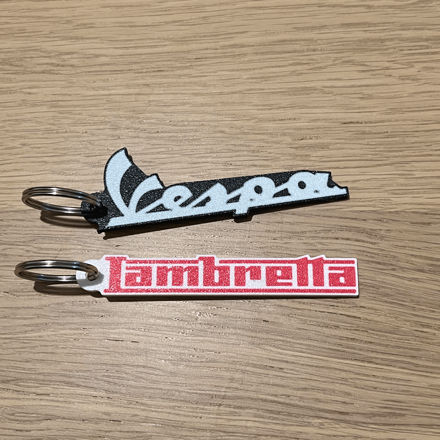 Vespa vs Lambretta keychain