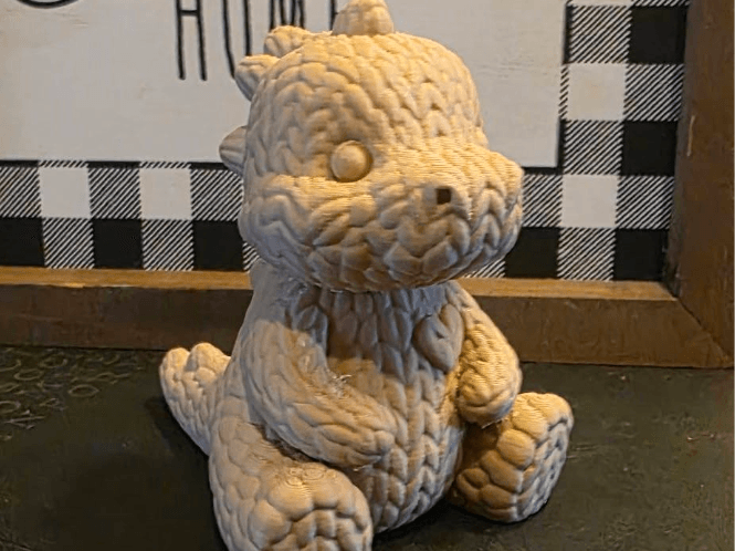 Cute Valentines Day Dinosaur Seated with Heart