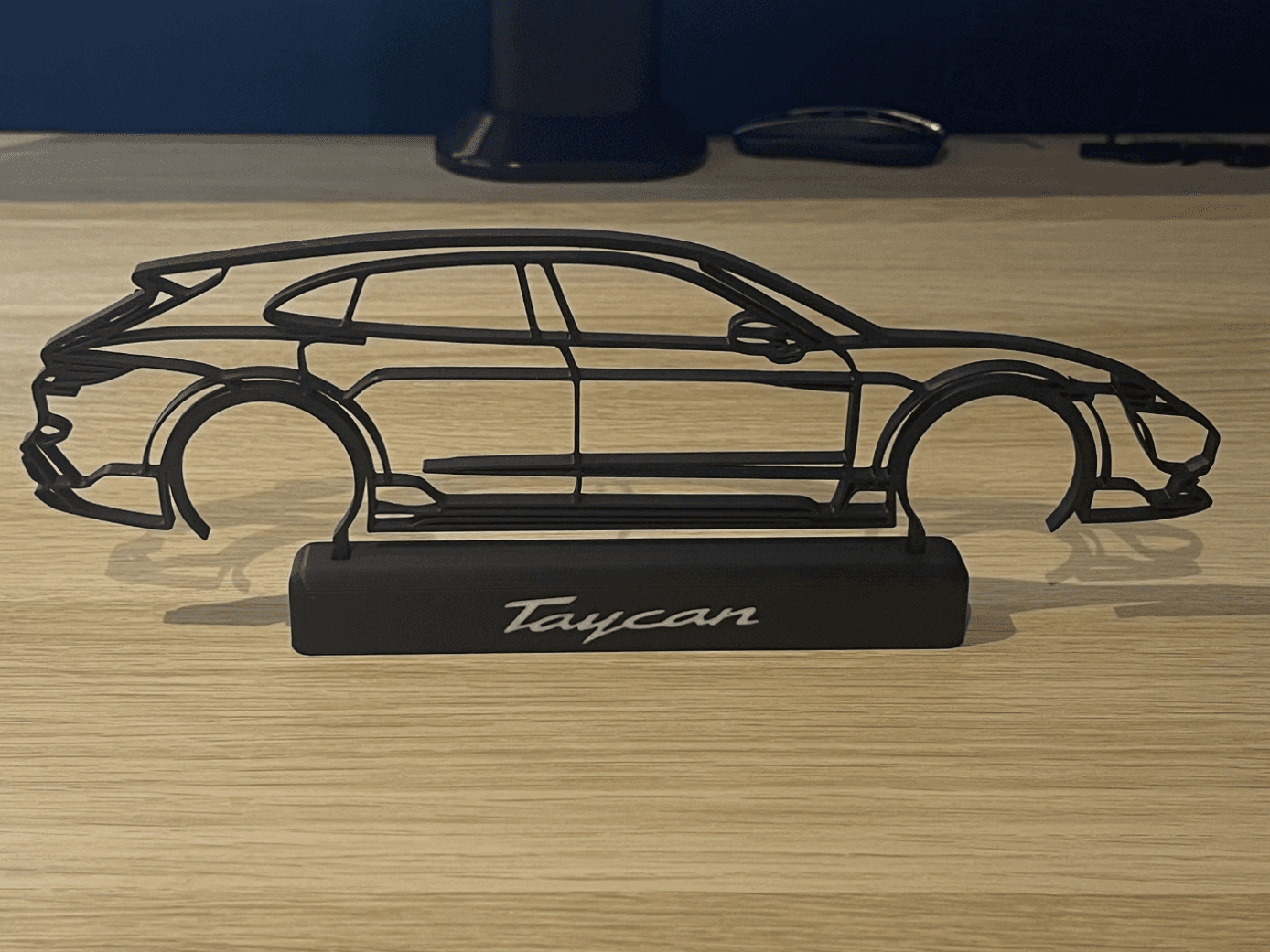 Porsche Taycan Cross Tourismo Silhouette and Stand