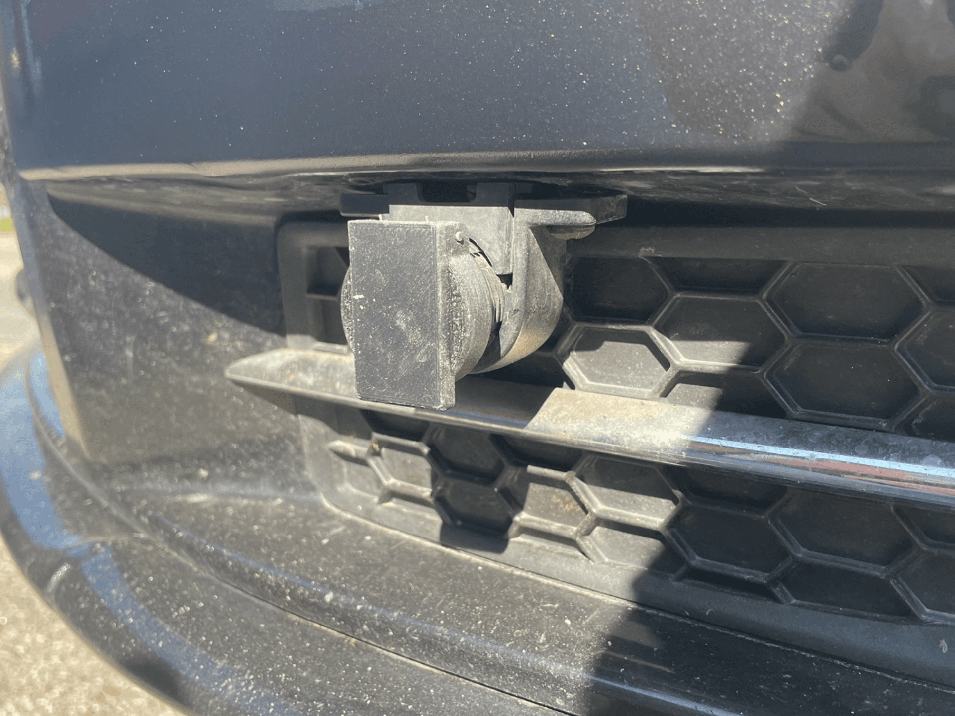 Engine heater connection cover