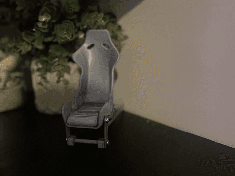Racing car seat phone holder