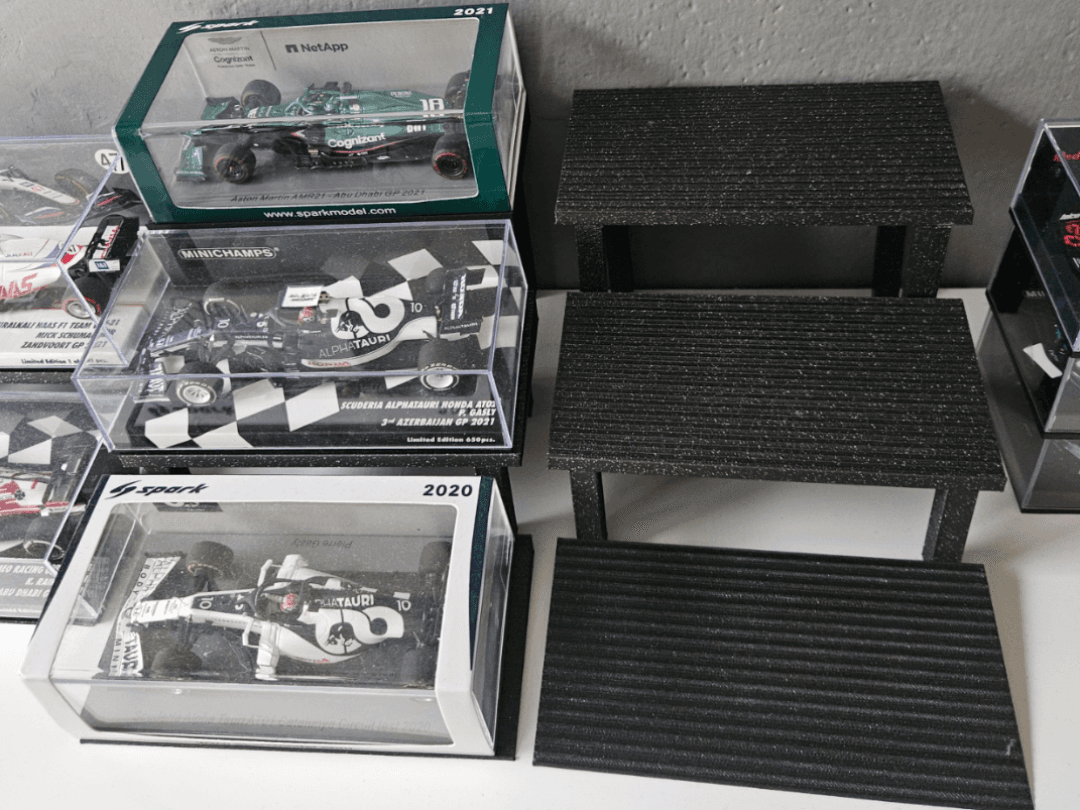 Stackable stand for F1 models