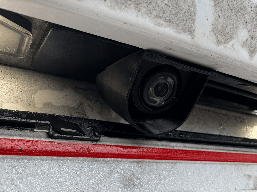 Tesla rear camera shield