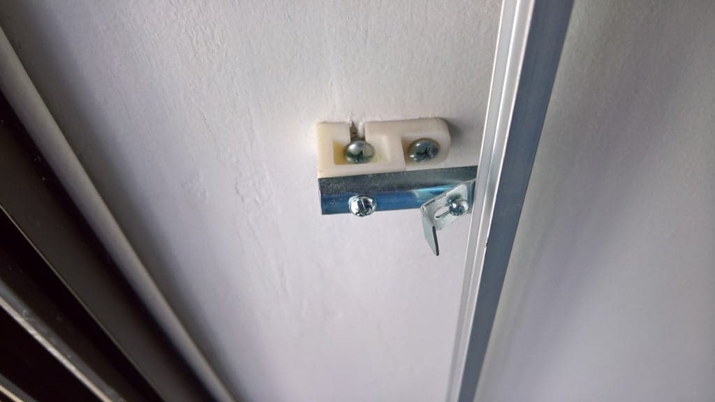 Curtain T track flat ceiling fixture/spacer
