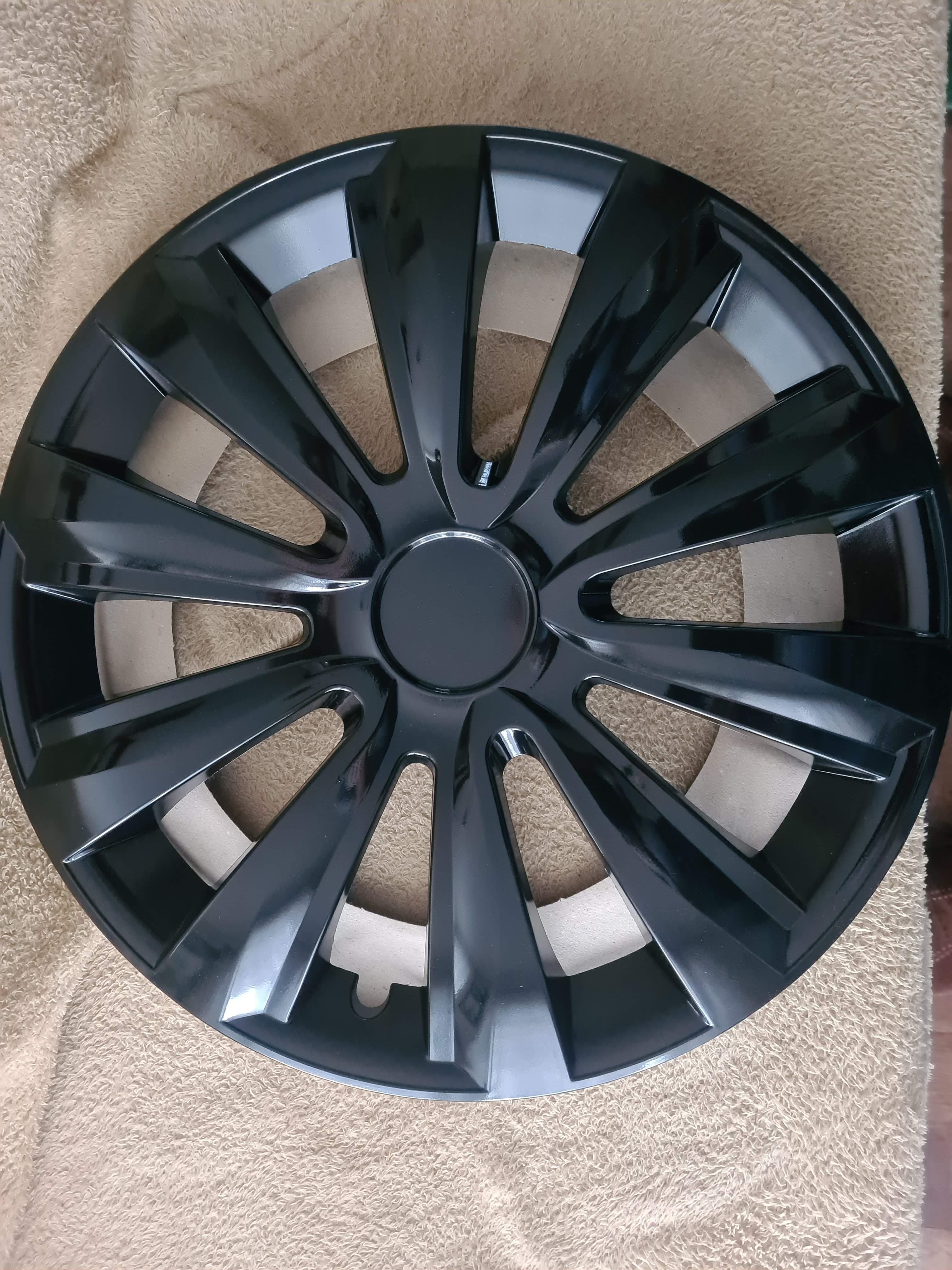 Toyota logo covers for 15" hubcaps by Jestic, model Delta Black