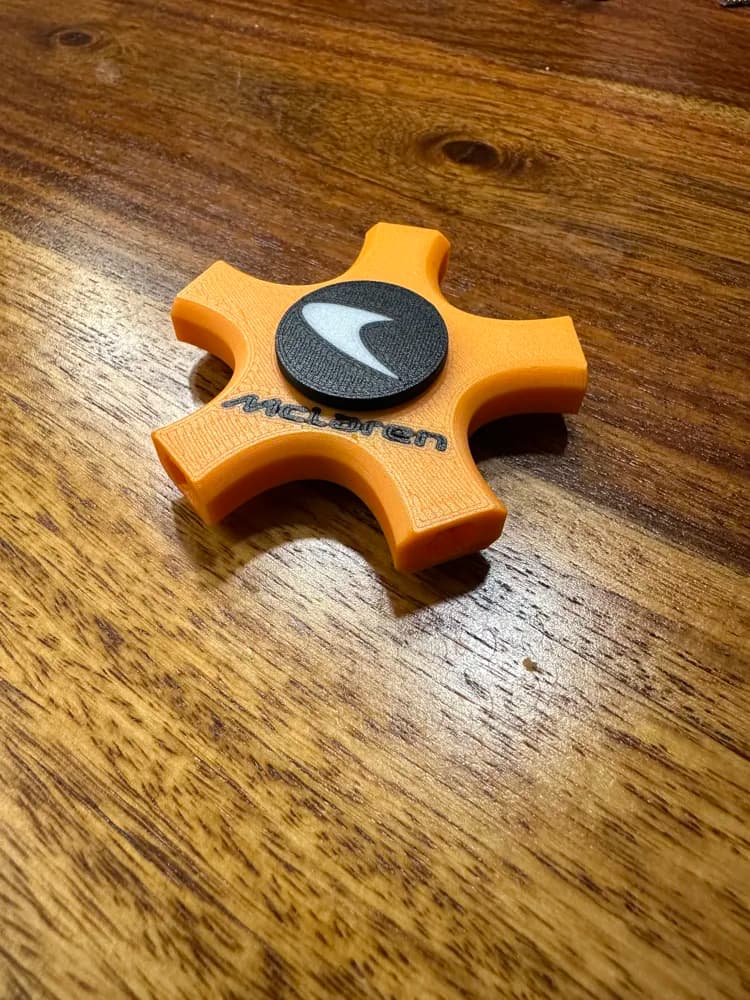 Fidget spinner bit holder McLaren style